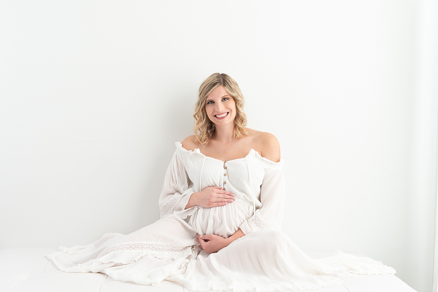 Studio Maternity Session in Chagrin Falls. Photos by Rachel Brookes Photography.