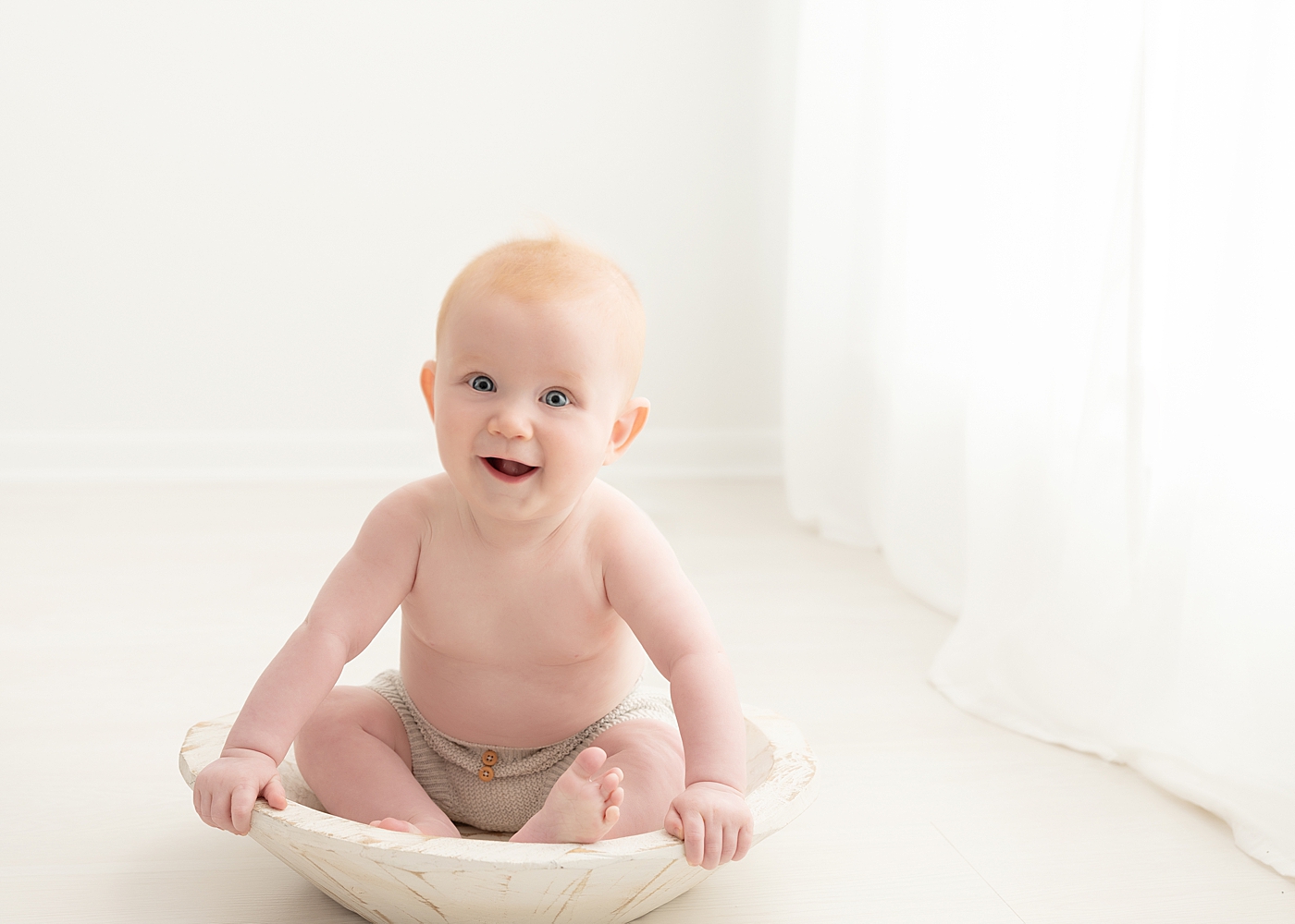 Milestone sitter session in Chagrin Falls studio. Photo by Rachel Brookes Photography.